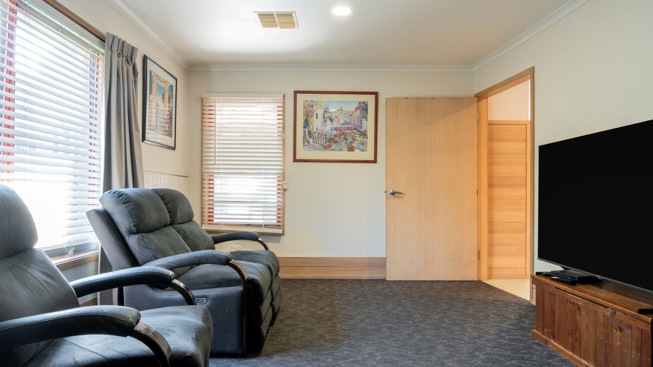https://possability.com.au/wp-content/uploads/2025/07/Fern-Lodge_loungetv-web.jpg
